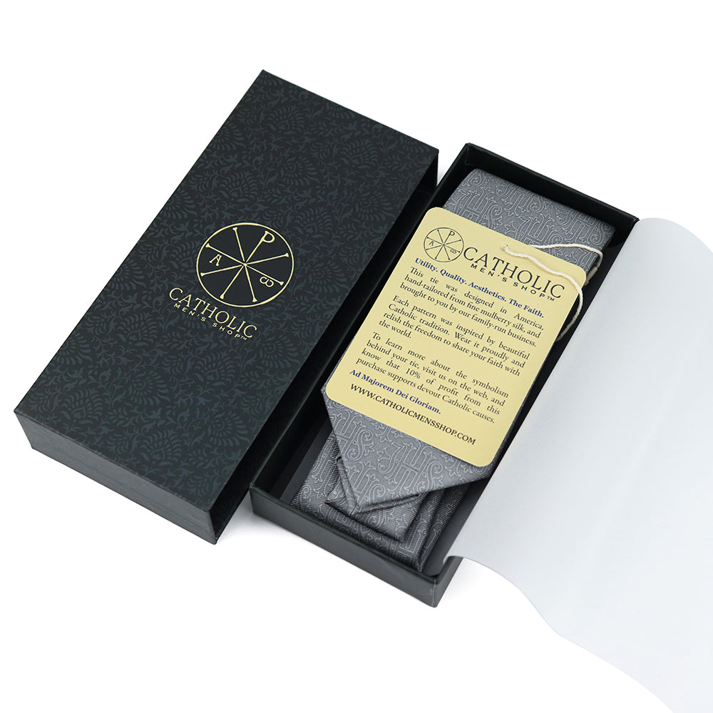 Faith-inspired Catholic necktie, JHS motif uniting craftsmanship and conviction