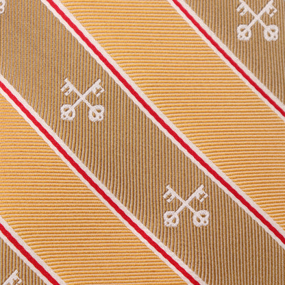 Close-up of a patterned tie with diagonal stripes and decorative elements.