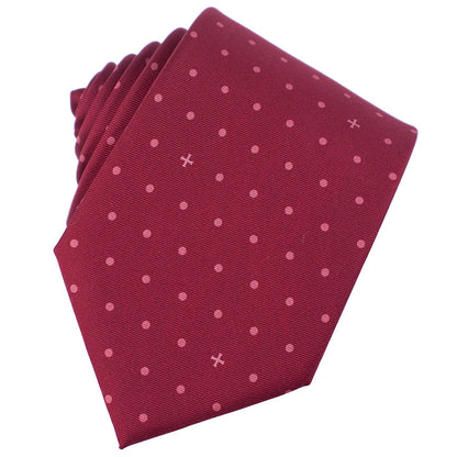 Folded burgundy tie with pink polka dots on a white background