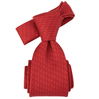 Red patterned tie on a white background. Catholic stocking stuffer for men. Premium faith-based necktie.