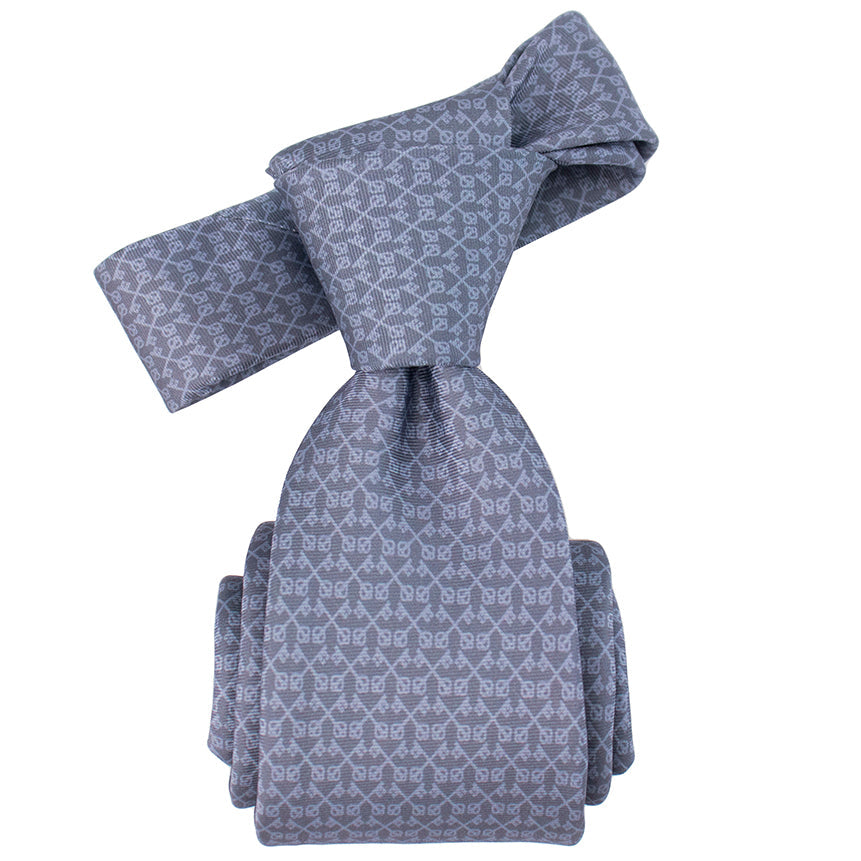 Blue patterned tie on a white background
