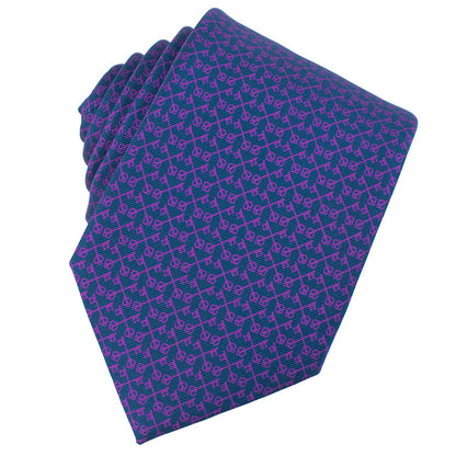 Folded purple tie with a pattern on a white background. Catholic Men's Shop silk necktie.
